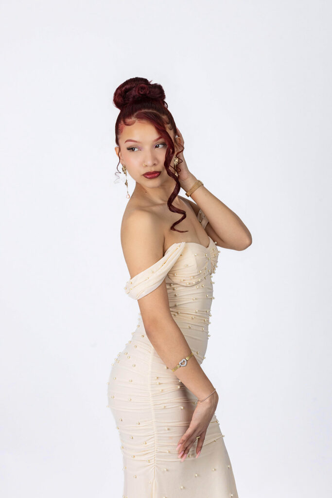 21st birthday studio portrait of Juliana celebrating in an Indianapolis photography studio with a glam, confident look