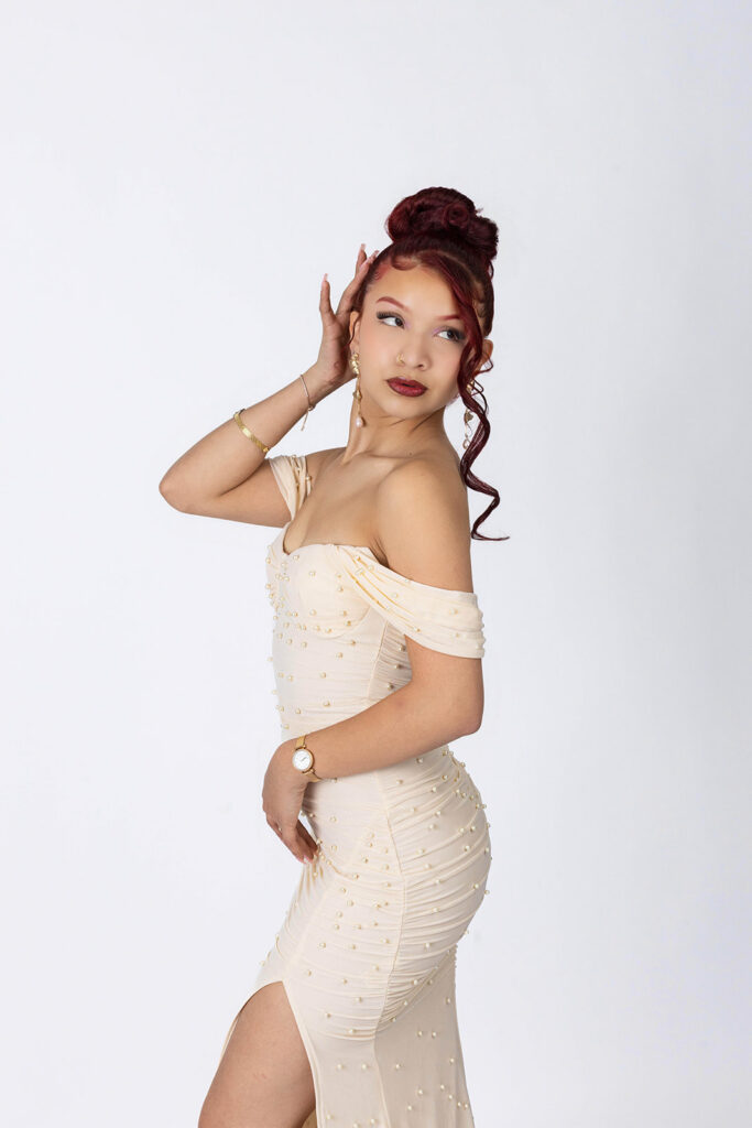 21st birthday studio portrait of Juliana celebrating in an Indianapolis photography studio with a glam, confident look