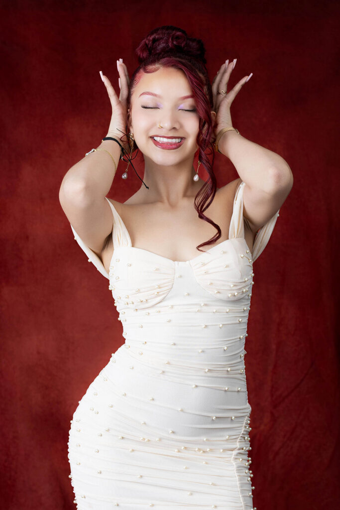 21st birthday studio portrait of Juliana celebrating in an Indianapolis photography studio with a glam, confident look